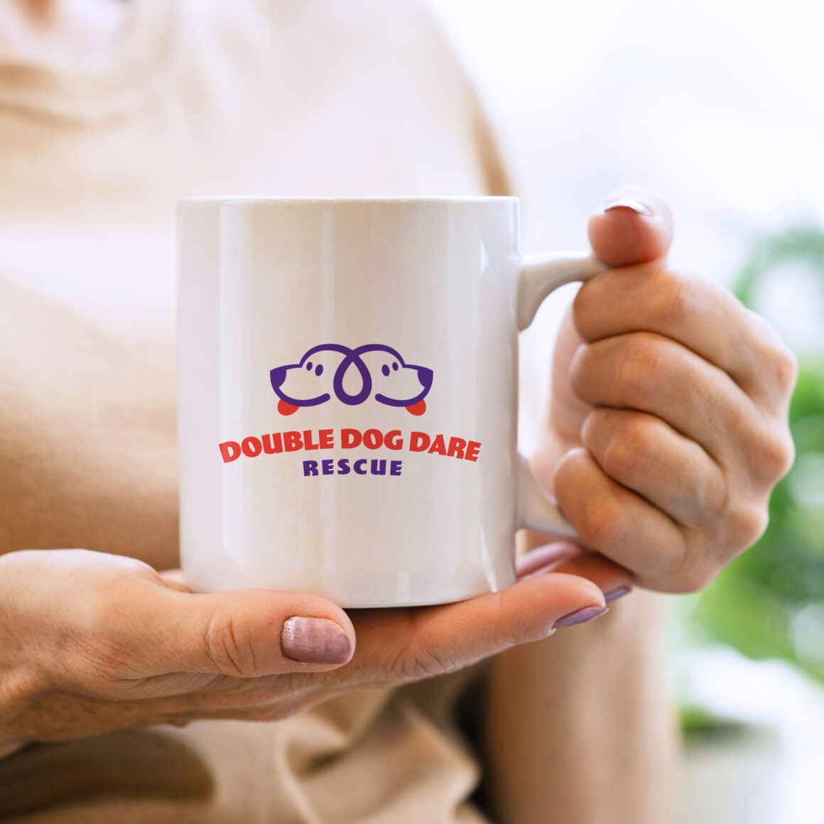 mockup of a white mug with the Double Dog Dare Rescue logo